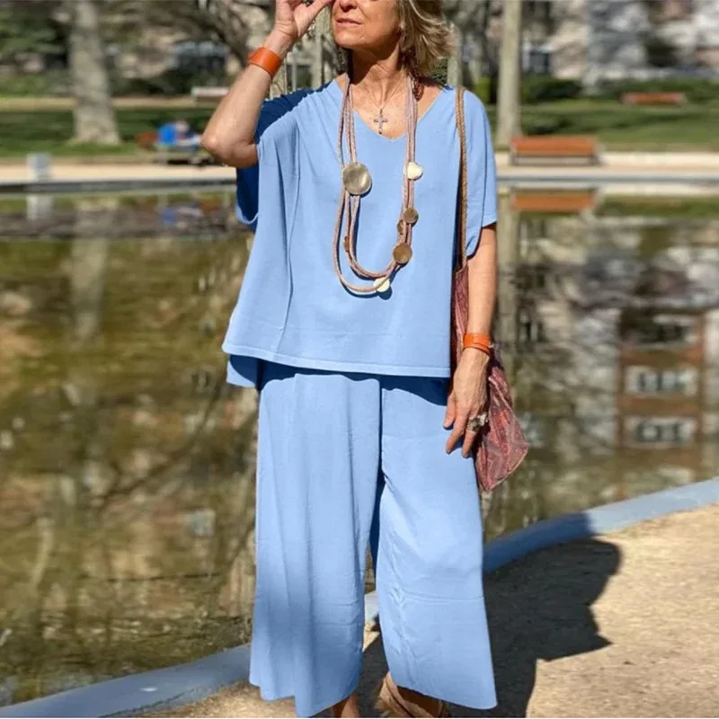 

Casual Solid Color 2 Piece Set Loose V-neck Short Sleeved Pullover Top Wide Leg Pants Set Women Spring Fashion Commuter Suit