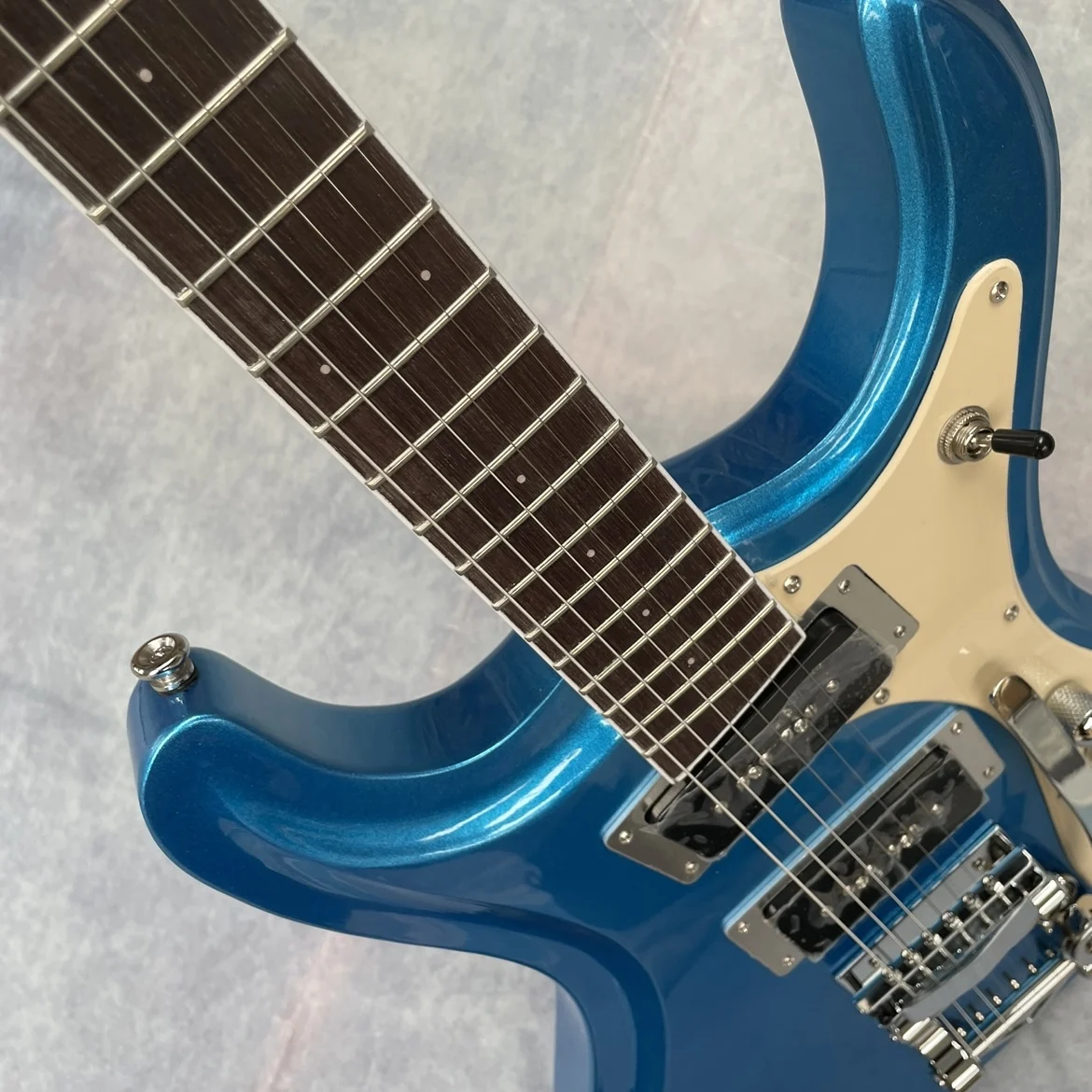 Metallic blue 6-string guitar, rosewood fingerboard electric guitar, white hardware guitar view 5
