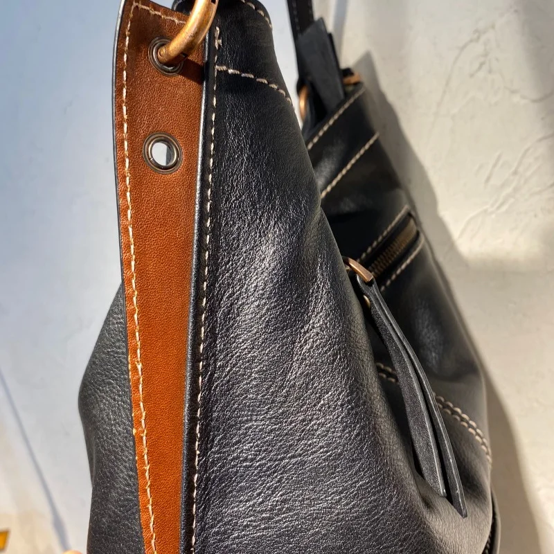 High quality women's bag new simple solid color first layer leather multifunctional small bucket shoulder bag crossbody bag