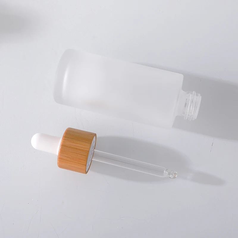 30ml 50ml 60ml 80ml Flat Shoulder Frosted Glass Serum Dropper Bottle Bamboo Top Skincare Face Serum Glass Dropper Bottle