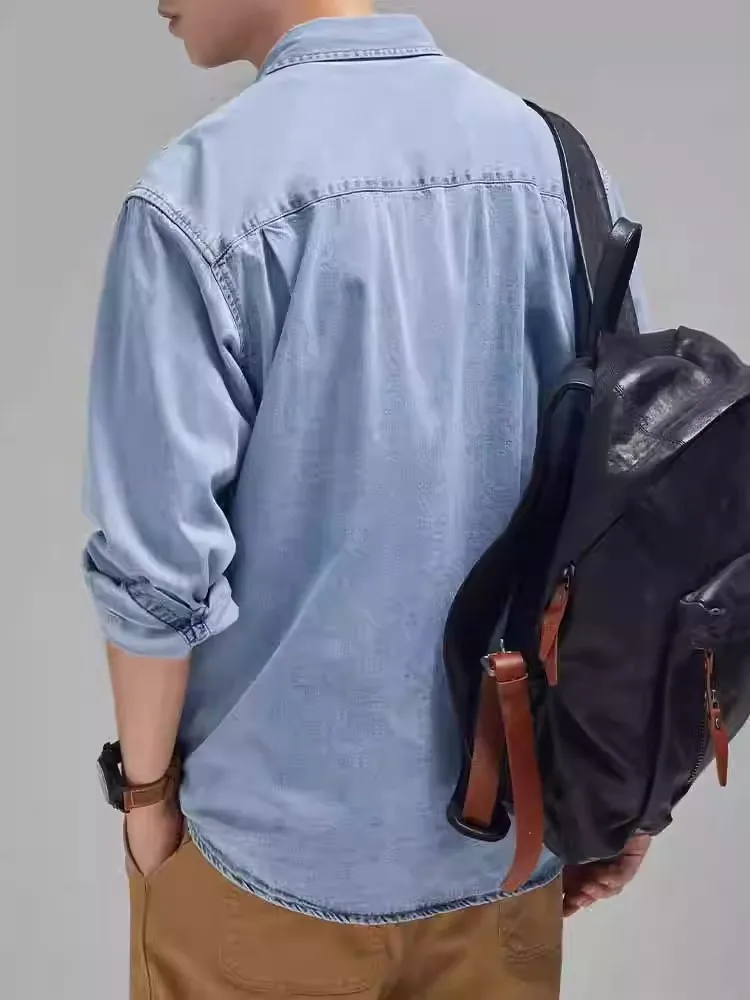 

Мужская джинсовая рубашка свободного кроя с длинным рукавом, повседневная, синяя, в стиле кэжуал, на пуговицах, из смесовой ткани с полиэстером, молодежная мода