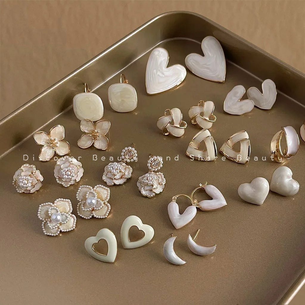 

DIY accessories French retro milk white drip earrings Korean light luxury high-end earrings personalized fashion temperament ver