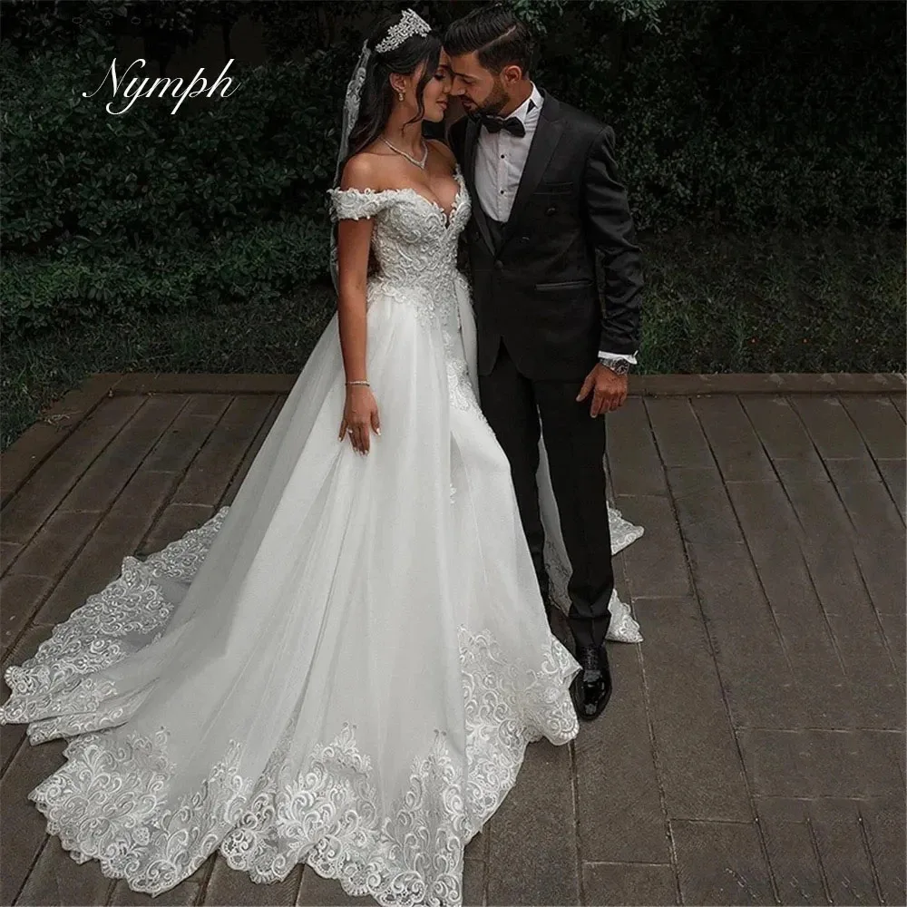 

Sexy Lace Appliques Mermaid Wedding Dresses Beaded Boat Neck Bridal Gowns with Detachable Train Customized