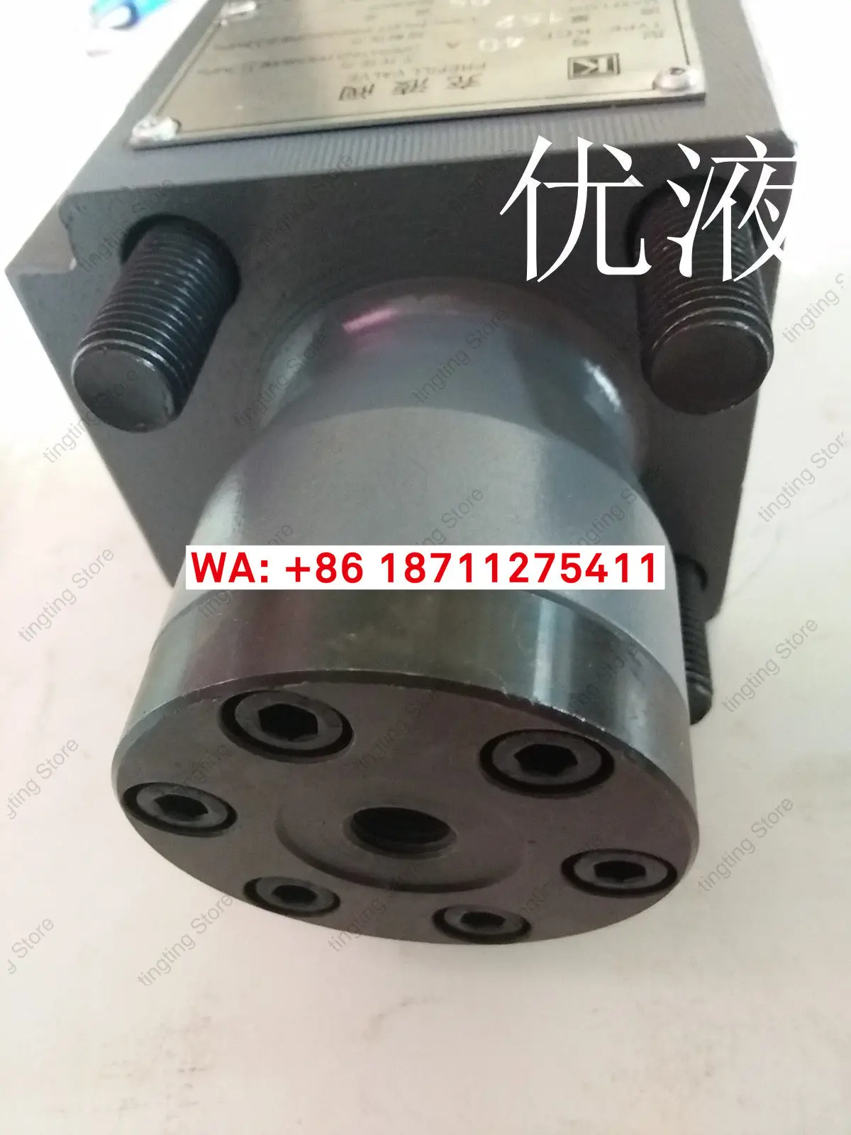 Short head hydraulic charging valve
