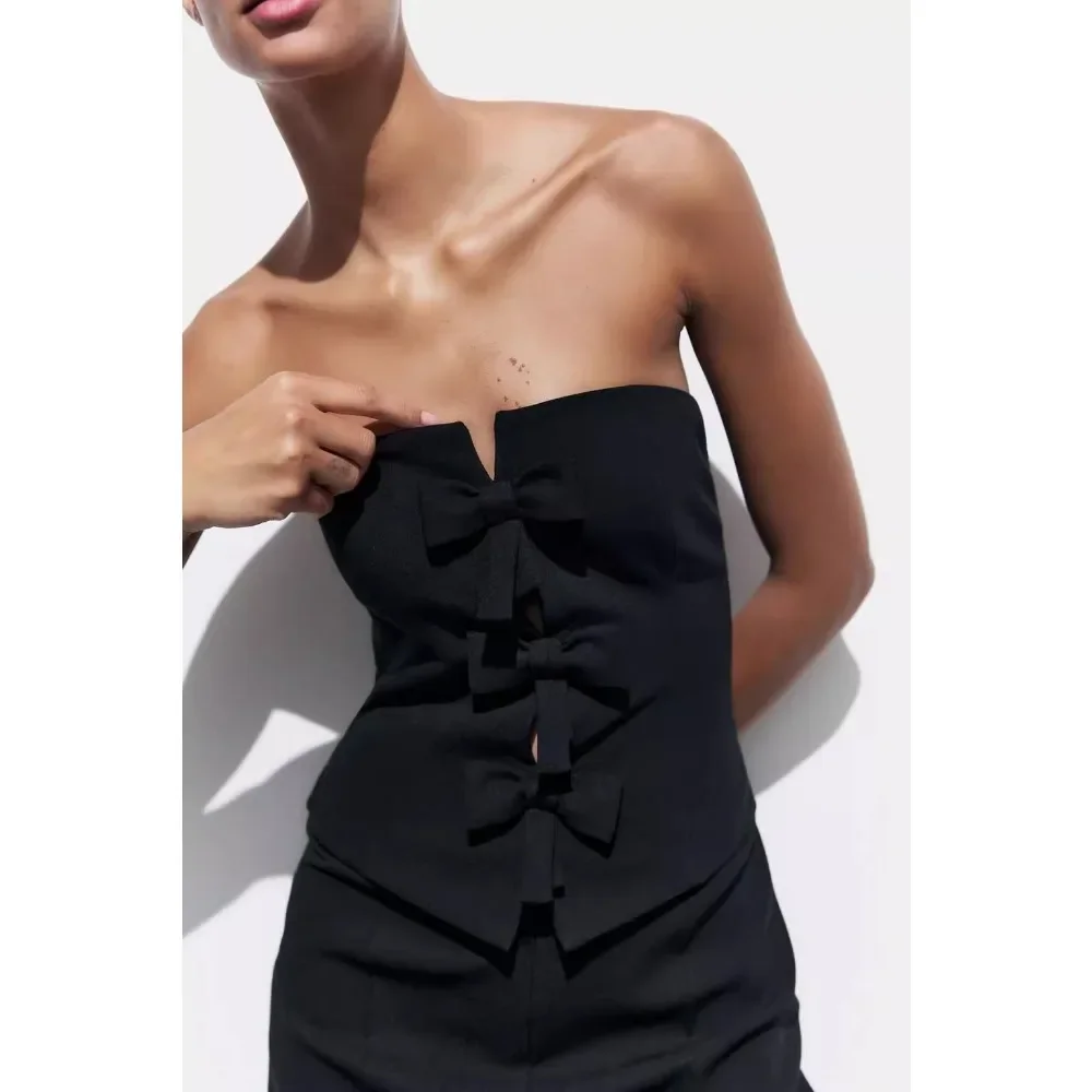 จั๊มสูทผู้หญิงแฟชั่นปี 2025 แขนกุด เปิดหลัง ซิปด้านข้าง แต่งโบว์ 3 มิติ โปร่ง จั๊มสูทขายาวทรงกระบอก สีดำ ผอมเพรียว