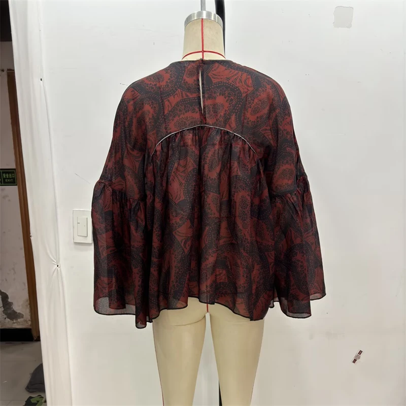 KEYANKETIAN 春/秋の新エスニックスタイルペイズリープリントシャツ女性のフレアスリーブルーズプルオーバーヴィンテージブラウス Mujer トップ