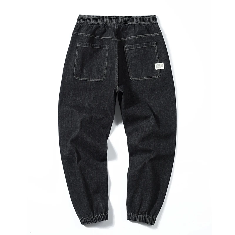 Jeans für Männer Loose Fit Jogger Hosen Overs ize Baggy Pants Harem weites Bein elastische Taille Kordel zug männliche Jeans hose verjüngt