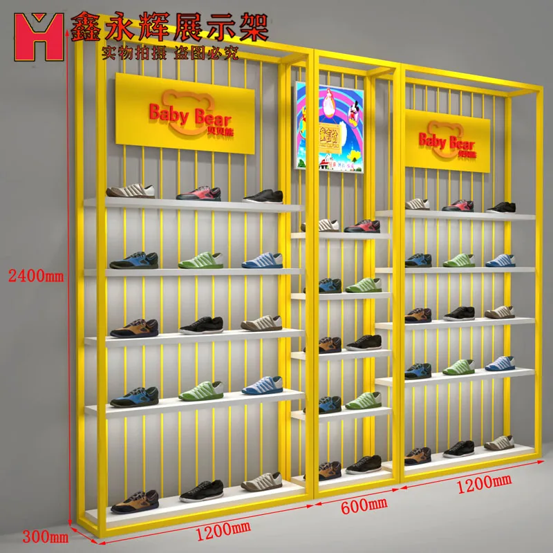 Shoe store shoe shelf children's clothing children's shoe rack against the wall display cabinet little yellow duck same shelf