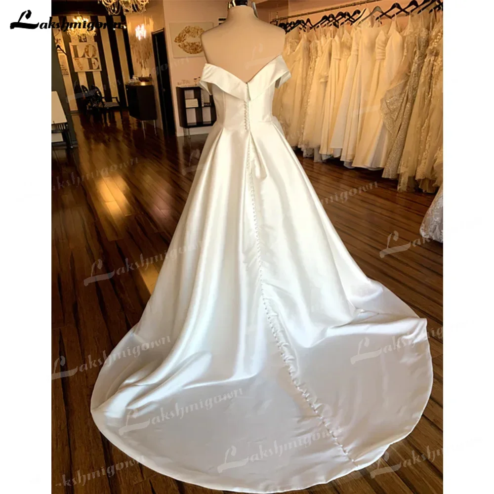 Una línea de vestidos de novia con hombros descubiertos, tren capilla, hecho a medida, satén, escote en forma de corazón, vestidos de novia elegantes, formalesдебное пла