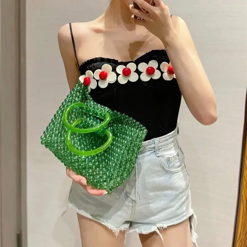 Bolso de mano con cuentas acrílicas verdes para mujer, diseño de lujo, cristal transparente, Asa superior, tejido a mano, fiesta, tendencia de verano