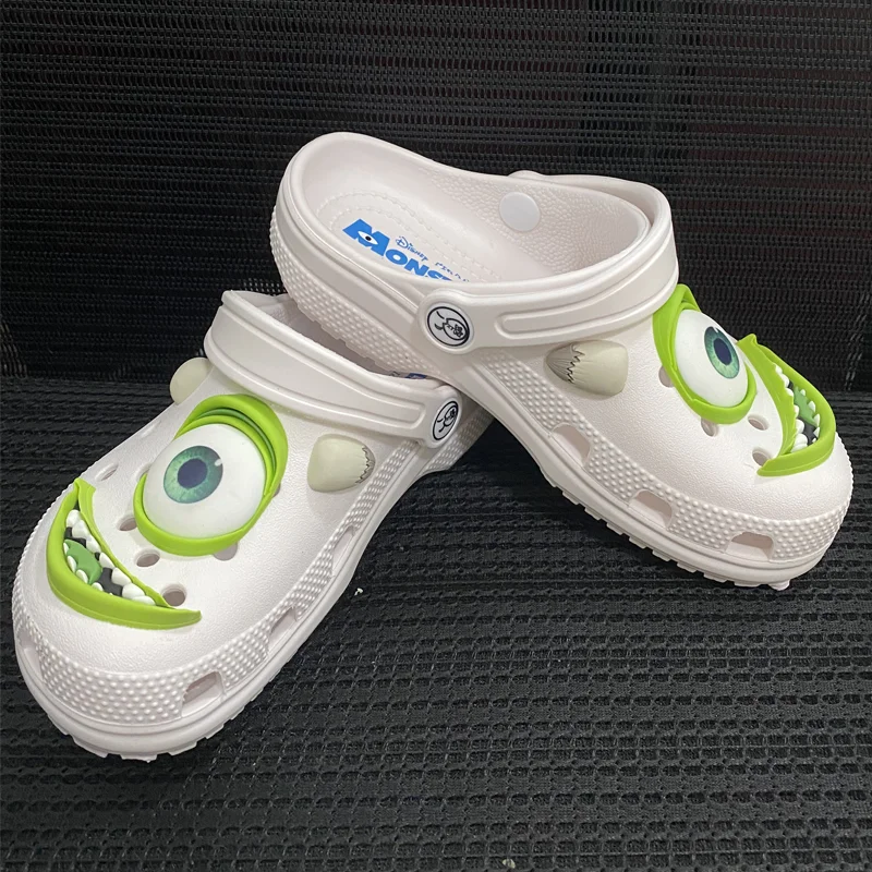 

Cute Anti-Slip Sandals for Summer Neutral Beach Shoes with Three Eyed Monster Hole Design Toy Couple Slippers for Men And Women