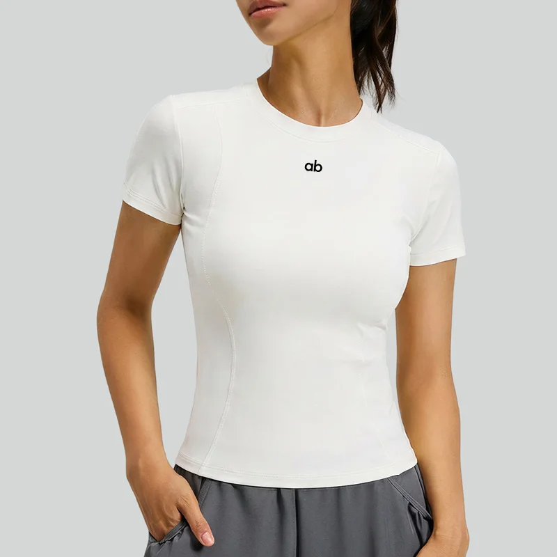 T-shirt de yoga d'été nouveau style simple à manches courtes pour femme, séchage rapide, respirant, élastique, haut de yoga moulant, vêtement de fitness