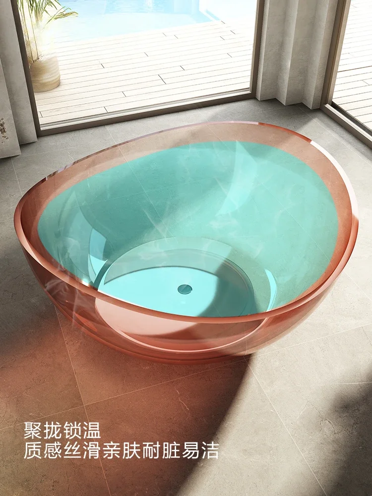 Pink round shaped transparent resin bathtub