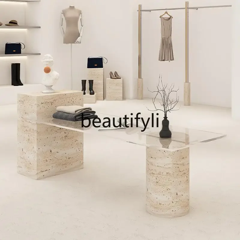 

Clothing store travertine glass flowing table women's clothing store jewelry ornament display table