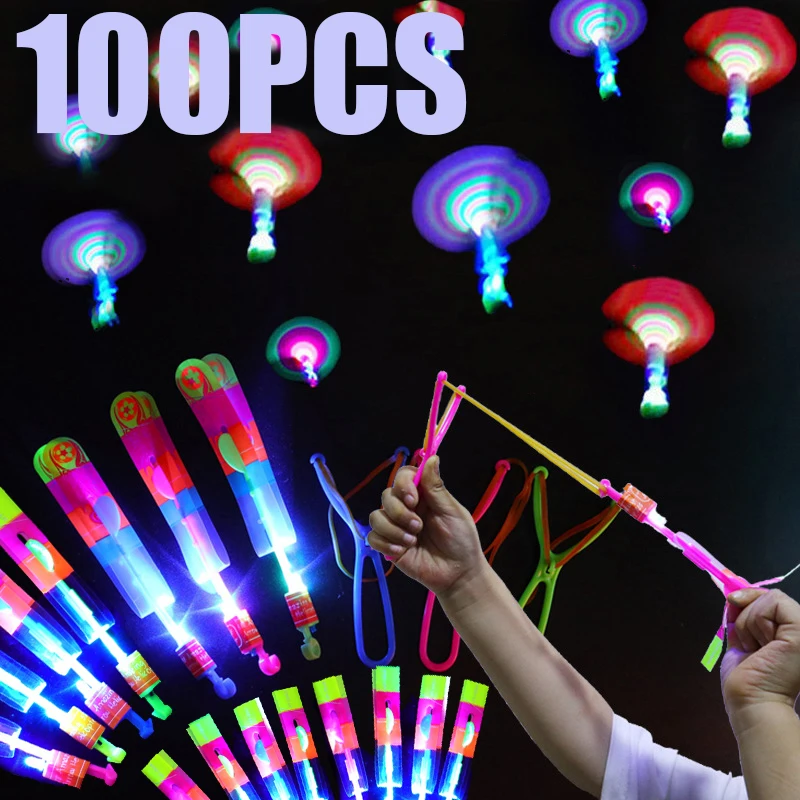 100pcs Amazing Light Toy Arrow Rocket Helicopter Flying Toy LED Light Toys Party Fun Gift Rubber Band Catapult