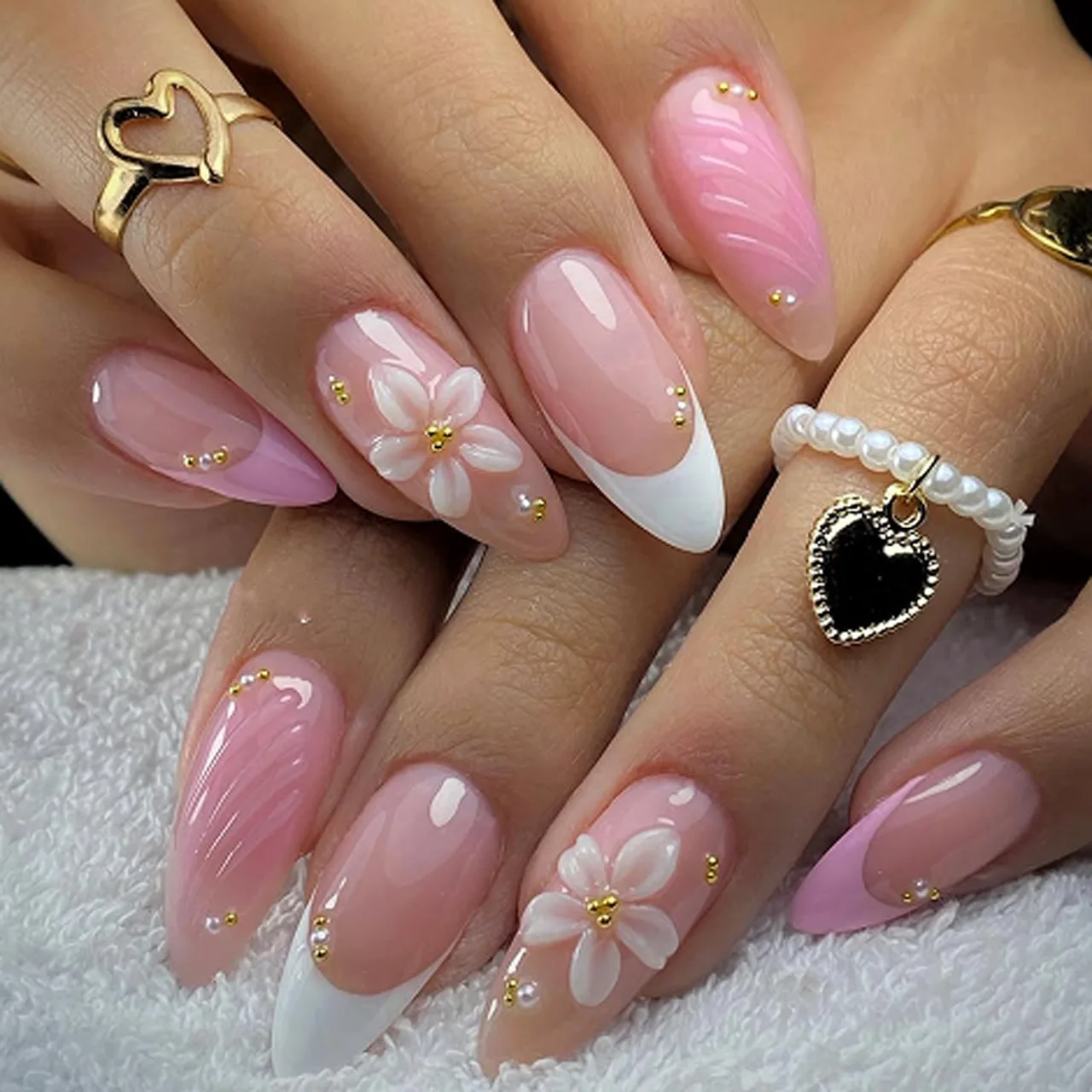 

3D floral pink short almond false nails with glitter diamond accents for nail art and protective wear