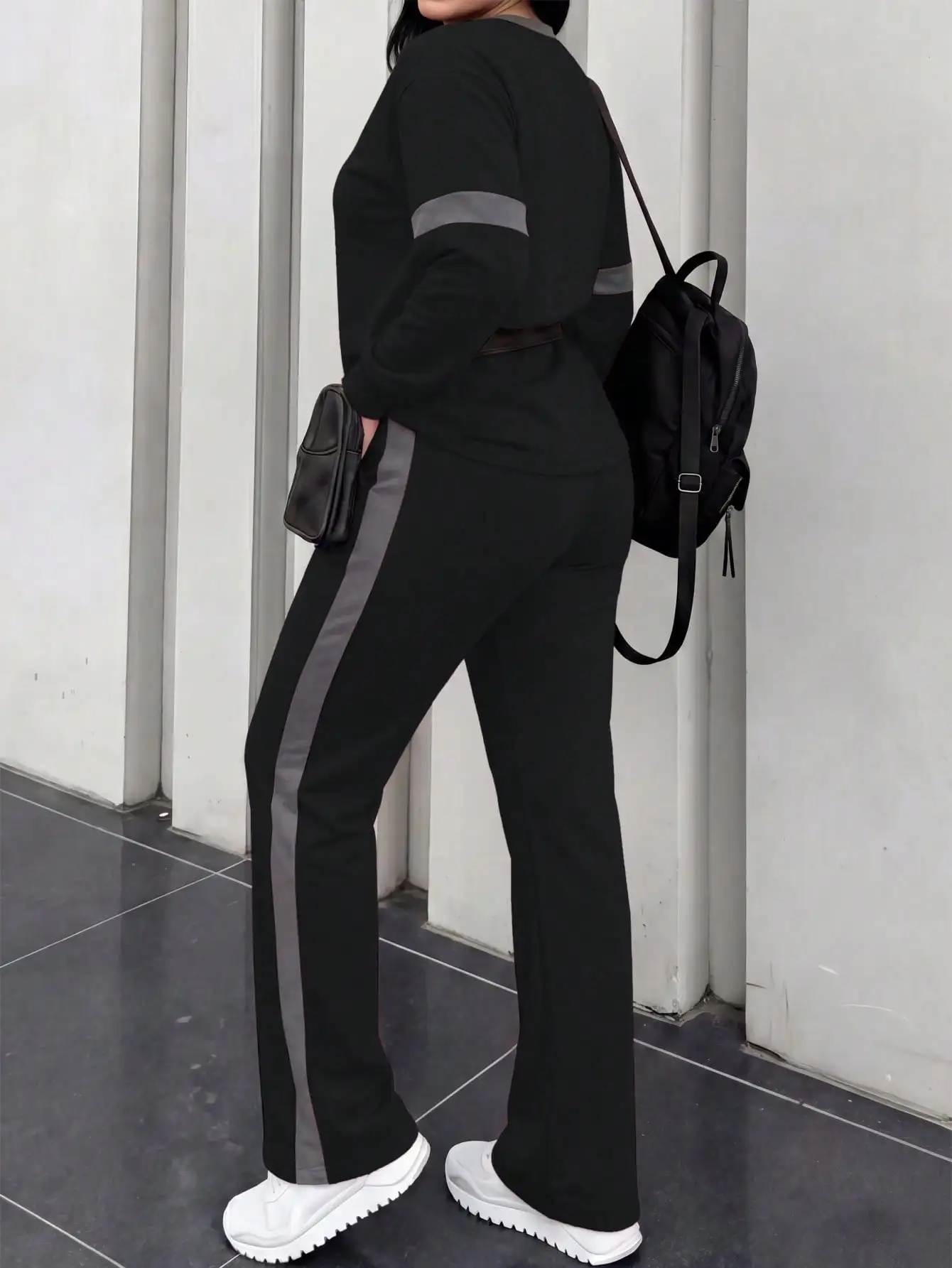Novedades de primavera y otoño para mujer: cómoda camiseta holgada de manga larga con cuello redondo, estampado a rayas y bloques de color, de marca de moda, combinada con pantalones sueltos de cintura elástica para uso diario, conjunto de dos piezas.