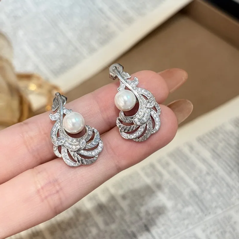 925 sterling silver exquisite feather pearl earrings, women's light luxury fashion ring, high-end temperament two-piece set