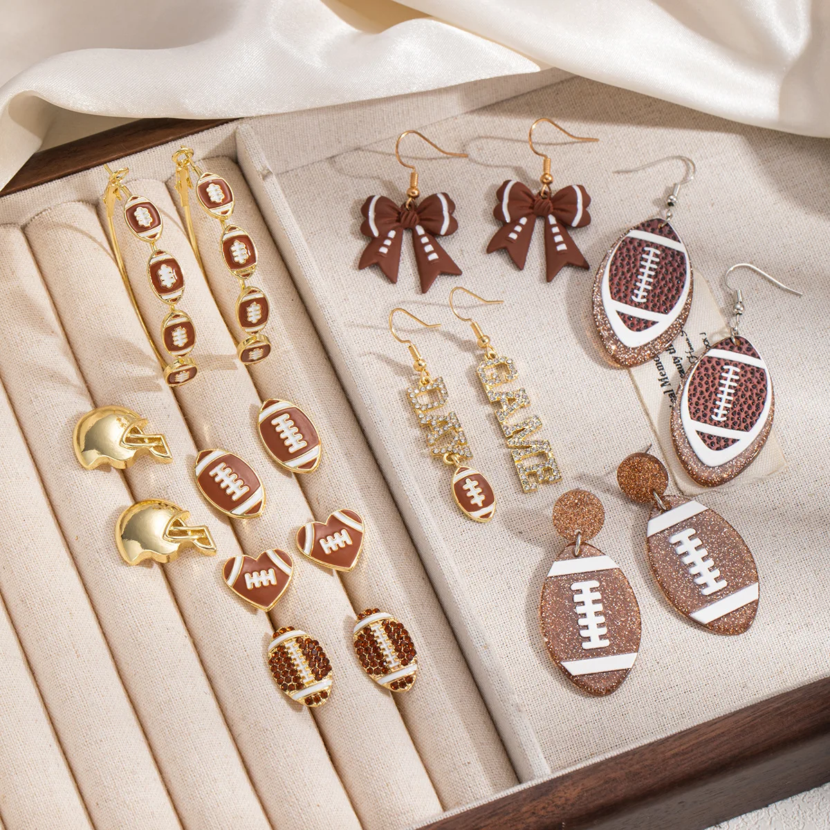 Cross border drip oil rugby earrings Super Bowl sports fashion high-end earrings niche accessories for women