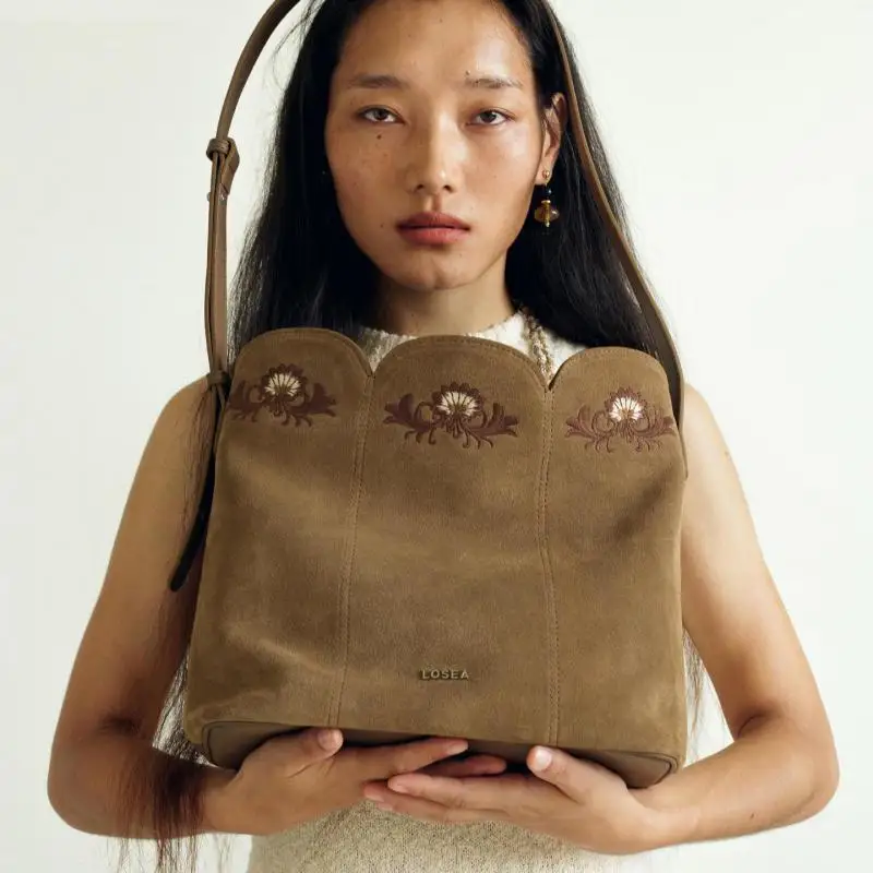 

Light Luxury Fashion New High-quality Top Layer Cowhide Frosted Suede Bucket Type Single Shoulder Crossbody Bag For Women Trendy
