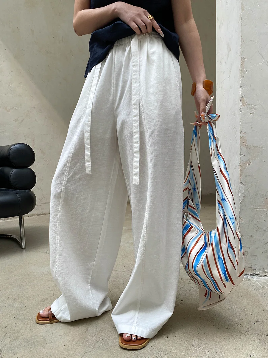 

Summer women's solid color straps, elastic waistband, split cut, hanging, floor hugging casual pants
