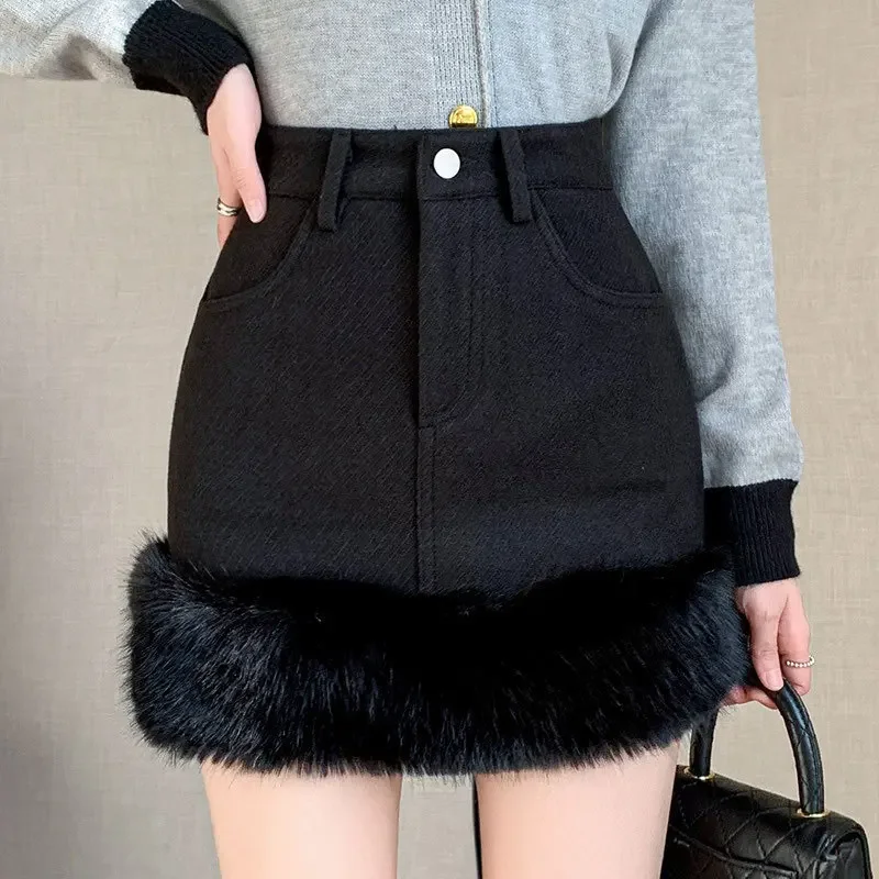 Korean small fragrance short skirt women's autumn and winter new high waist Mao Mao A-word skirt slim thickening hip skirt.