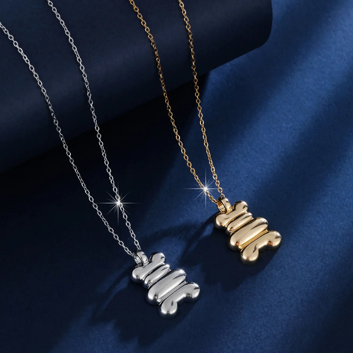This fashionable and cute bear pendant necklace is versatile and can be stacked as a neck accessory