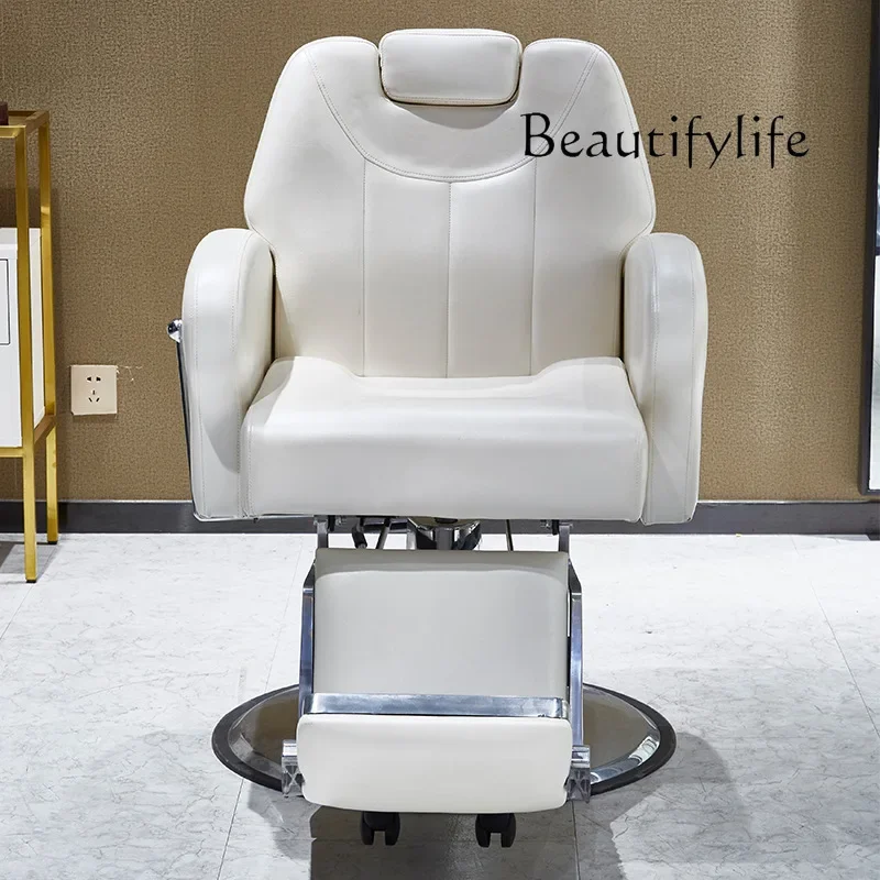 A reclining and rotating multi-functional hair cutting chair for barber shops