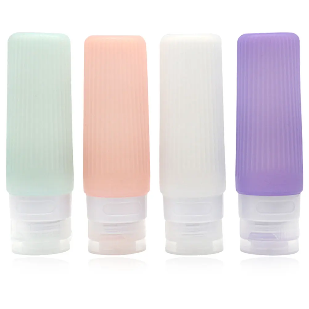 

4 Pcs Refillable Squeeze Bottles Portable Toiletries Containers Travel Shampoo Lotion Bottles Empty Silicone Skincare Tools