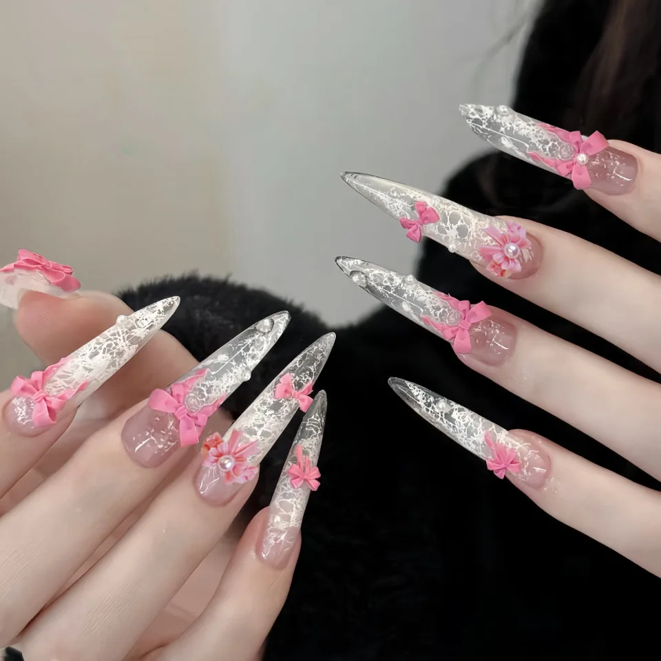 

24Pcs Pink White Press On Nails Long Stiletto False Nails with 3D Bow Lace Print & Pearl Full Cover Acrylic Fake Nails for Women