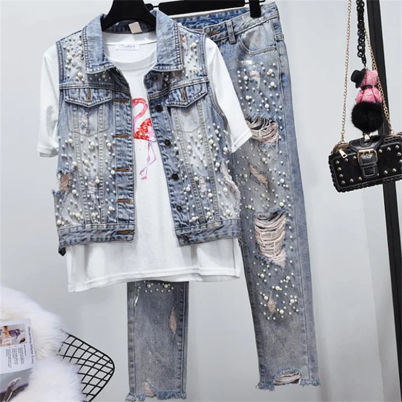 

Summer casual fashion women's pants new women's pearl ripped stretch denim jeans