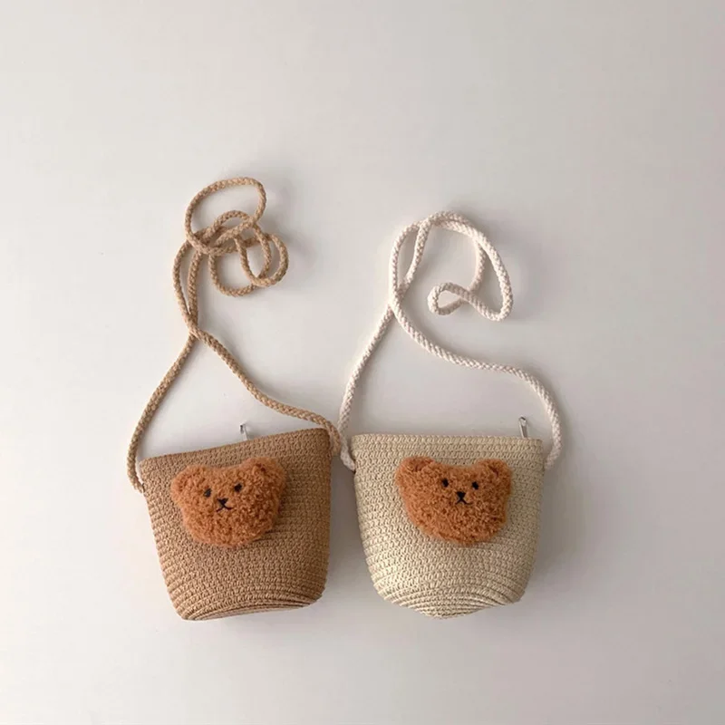 เกาหลีน่ารักหมีเด็กCrossbodyกระเป๋าฤดูร้อนHandmadeทอฟางไหล่กระเป๋าสําหรับสาวท่องเที่ยวกลางแจ้งเด็กกระเป๋าถือเหรียญ
