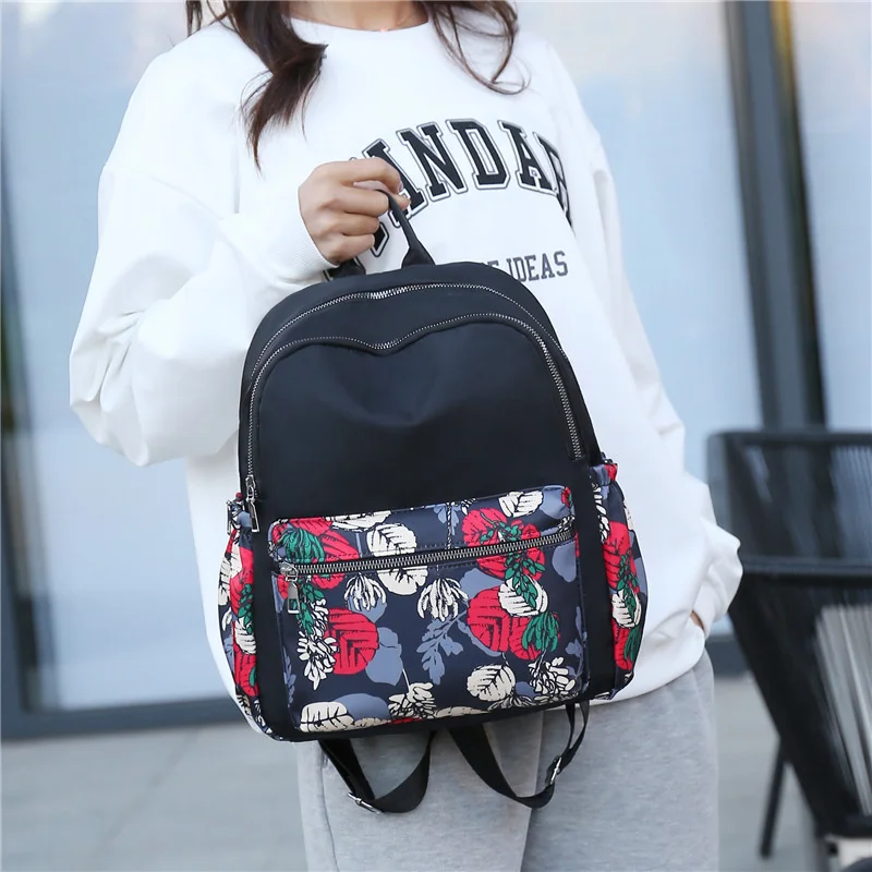 Backpack women 2022 new Korean fashion Oxford women's schoolbag large capacity printed leisure travel backpack