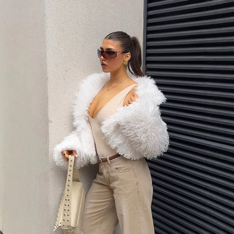 This Is A Thick, Warm and Eco-friendly Women's Faux Fur Coat. It Is A New Winter Fashion Coat with An Elegant and Stylish Look.
