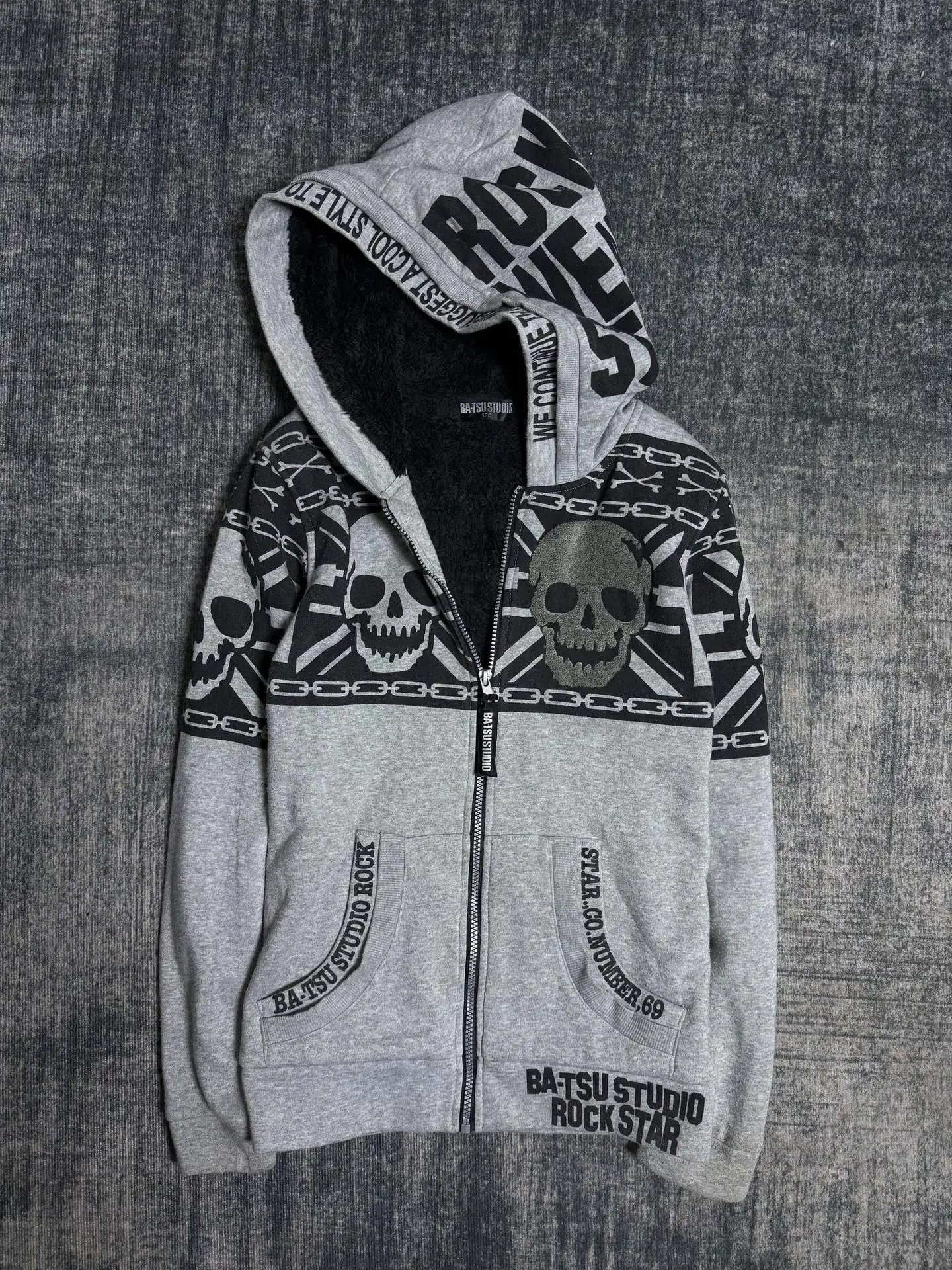 New design for men's and women's winter fashion street trend skull print pocket long sleeved hooded cardigan slim fit hoodie