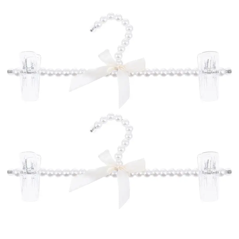 

2pcs Artificial Pearl Pants Hangers Clothes Hanging Hangers Clothing Hangers Christmas Faux Pearl Bow Hanger