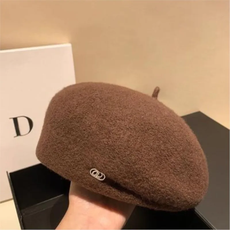beret headband shows off face little painter's hat and female bud are