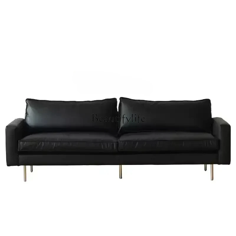 FGDivano في بيلي الحد الأدنى غراندي mucca نيرا retrò soggiorno divano الفني في بيلي أ فيلا دريتا #1