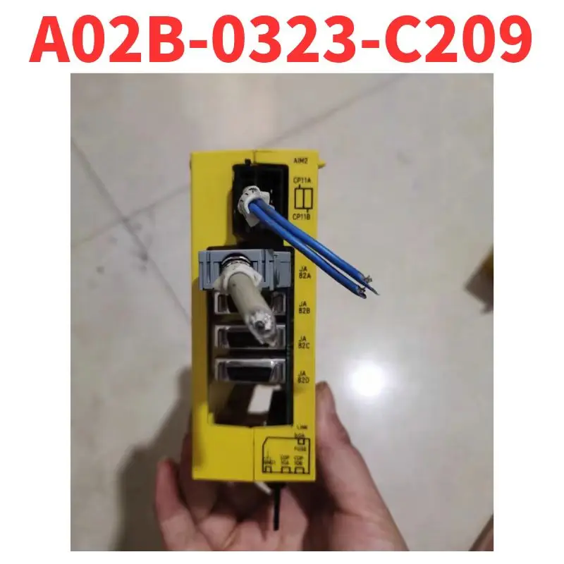 Used A02B-0323-C209…