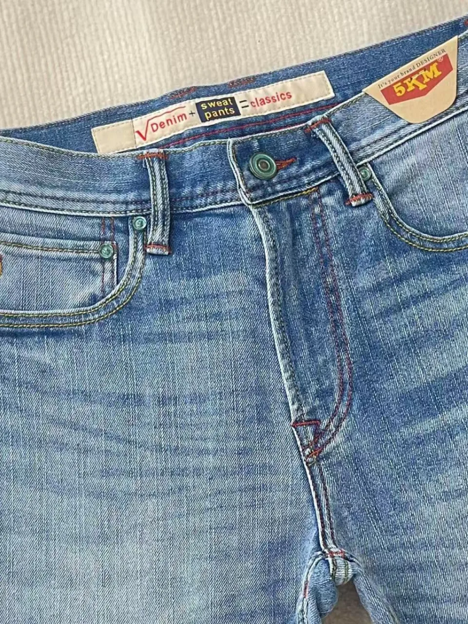 ฤดูร้อนน้ําหนักเบา 11oz สีแดง Selvedge DENIM Magnolia กางเกงยีนส์อินเทรนด์ผ้าฝ้าย 99% ล้างยืด Slim Tapered Fit กางเกงผู้ชาย 5KM