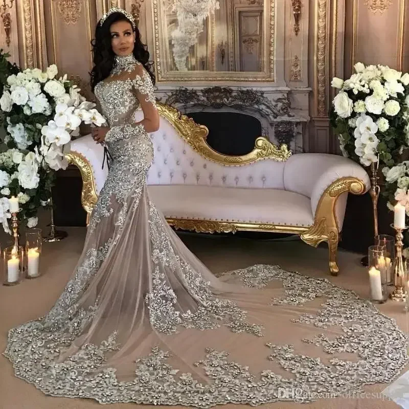 Abito da sposa a sirena personalizzato Perline scintillanti trasparenti sexy Applique in pizzo Collo alto Illusione Manica lunga Champagne Tromba da sposa Go