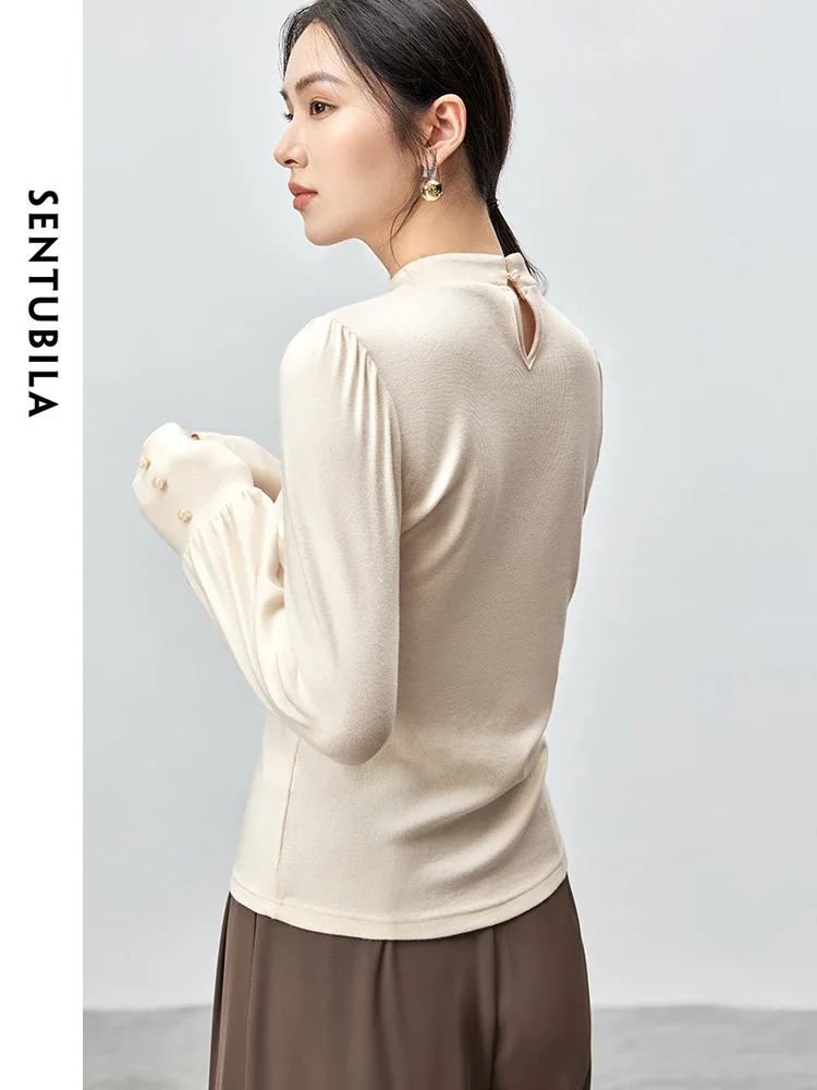 SENTUBILA Women Knitted Pullovers  2024 Autumn Chinese Style Stand Neck Pearl Button Solid Simple Long Sleeve Tops 143H56034