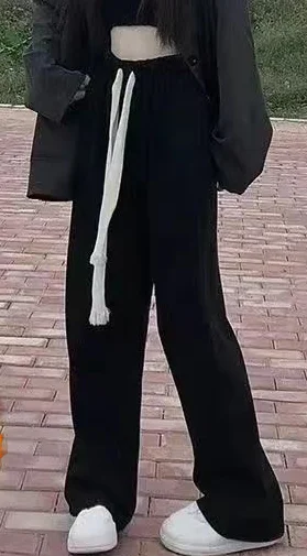 بنطال ذو قصة أرجل واسعة للنساء صيفي رفيع للغاية مثقوب مفرغ واسع الأرجل مقسم محب ناعم مطابق للتهوية قابل للتمدد 2025