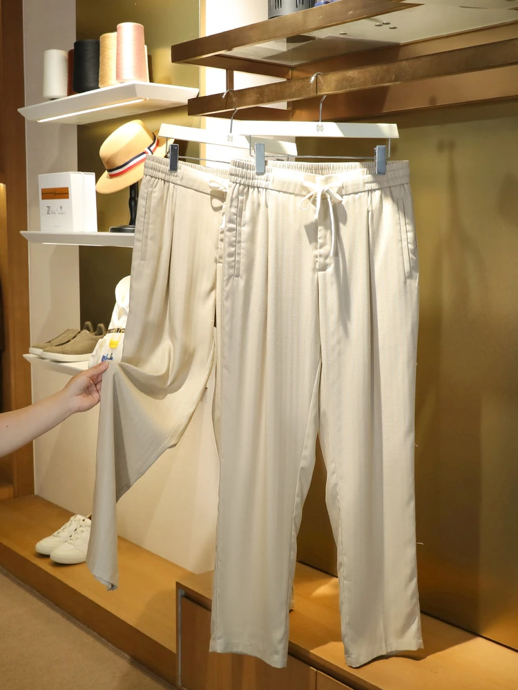 

Итальянские роскошные летние новые мужские брюки из смесового льна свободного прямого кроя, модные повседневные брюки с классическим клетчатым дизайном, комфортные...