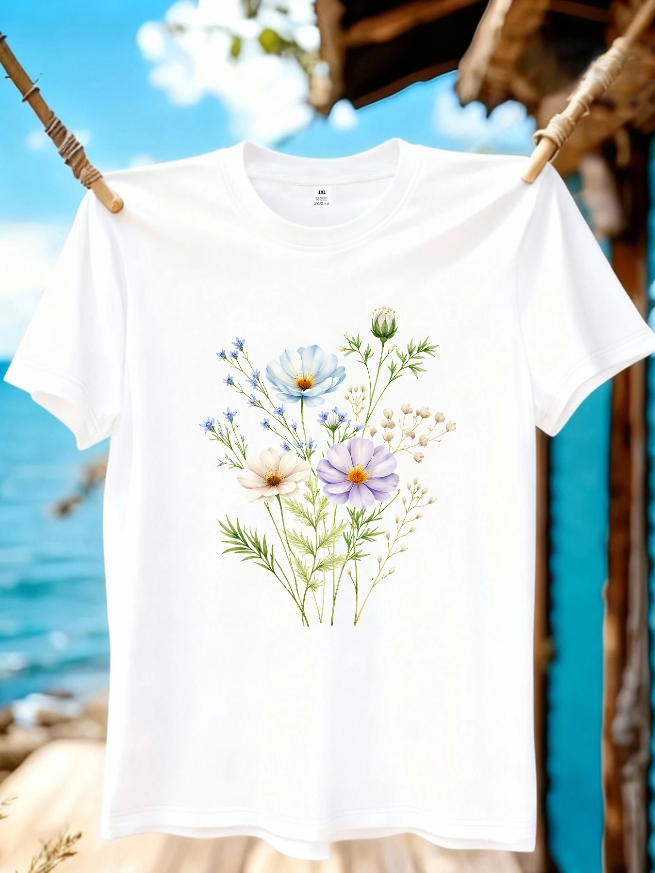 

【WZM10936】Женская футболка больших размеров с цветочным принтом, круглым вырезом, летняя, повседневная, с короткими рукавами, в уличном стиле, универсальная, больших размеров.