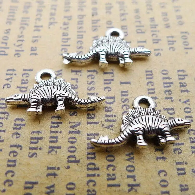 

30pcs 9x16mm tibetan silver color 2sided pattern little Dinosaur charms H0101