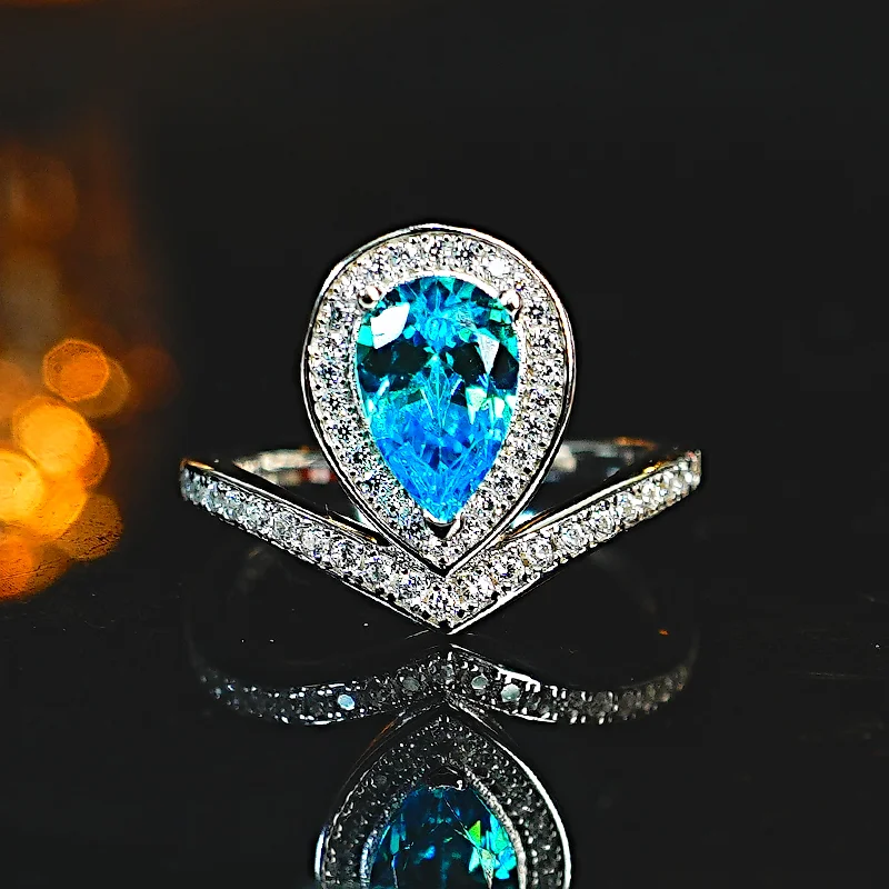 Light luxury niche Topa Blue Water Drop 925 Silver Ring with High Carbon Diamond Ice Flower Cutting Versatile Sweet Beauty