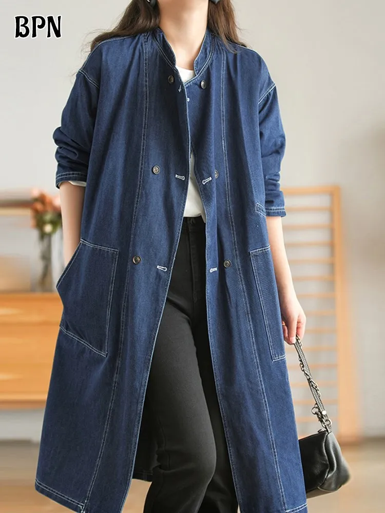 BPN Casual Denim Trench For Women Stand Collar Long Sleeve Patchwork Pocket Soild Loose Windbreaker Female Autumn Clothing New