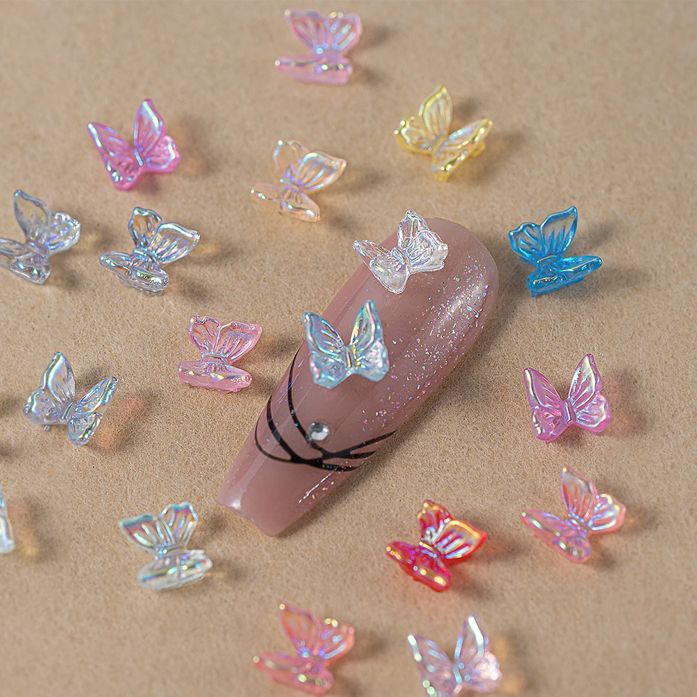 12 กริด/กล่อง Aurora ผีเสื้อสีม่วงเล็บ Charms Mermaid แฟลชสีชมพู/สีฟ้า/สีแดง Bowknot ตกแต่งเล็บ Polarized เรซิ่นเล็บ Pa