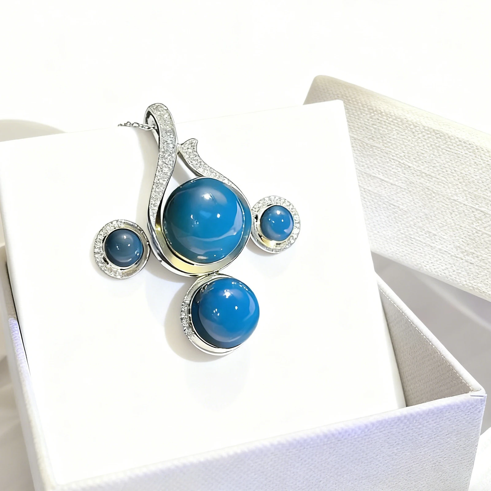 

Natural Mexican Blue Amber Sterling Silver Pendant Necklace Set Streamline Teardrop 16mm 13mm 7mm Light Luxury